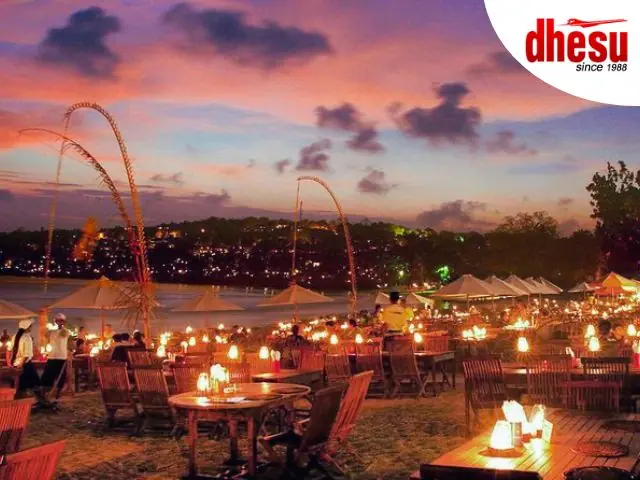 Jimbaran Bay BBQ seafood dinner Bali beachfront sunset
